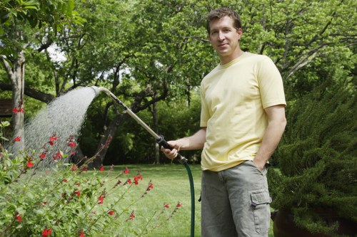 Friendly Lawn Mowing Notting Hill team member assisting a customer
